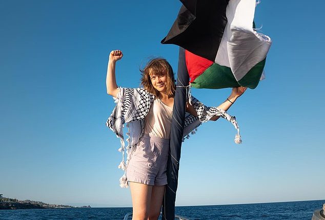 Israel has threatened to block Greta Thunberg's Freedom Flotilla from delivering aid to Gaza . The young activist is seen on board the ship, flying the Palestinian flag