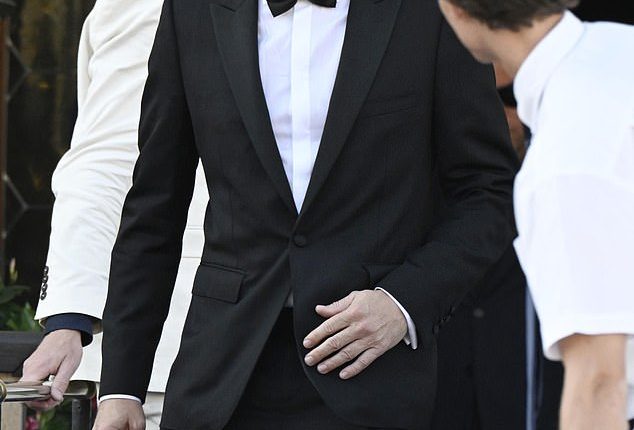 Leonardo DiCaprio was mocked over his bizarre penchant for a low sitting baseball cap as he attended Jeff Bezos and Lauren Sanchez' Venice wedding this week - pictured Friday at the nuptials