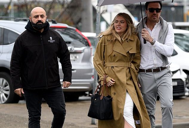 Jacqui Burfoot and Clint Rice arrived at Sydney's Campbelltown Local Court on Tuesday with a bodyguard for the AVO hearing