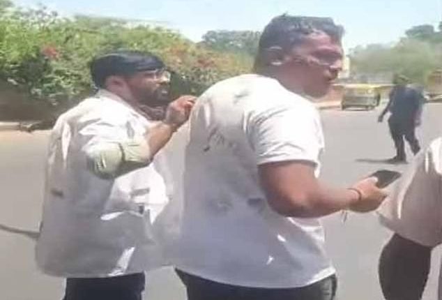 Astonishing footage showed the man walking away from the scene with some visible injuries to his face