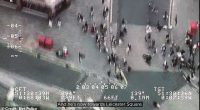 The dramatic moment an alleged phone thief on an e-bike cuts through a crowd of pedestrians in Piccadilly Circus as he tries to outrun police