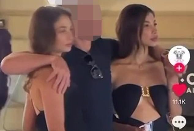 A high-profile Australian man (centre) was filmed chatting to two women on the streets of Monaco in footage he later allegedly spent 'an arm and a leg' to have deleted