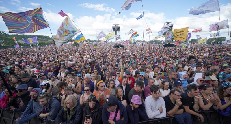 Mystery as huge billboard goes up outside Glastonbury Festival – and fans think it’s a hint at secret set