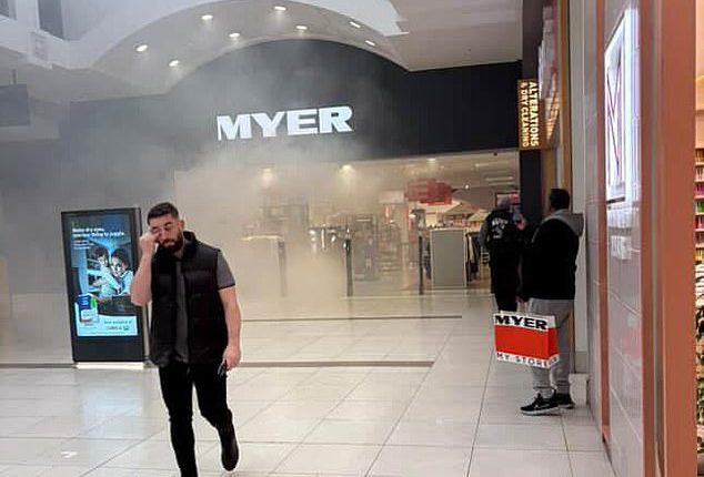 Northlands Shopping Centre in Melbourne's north was evacuated on Thursday morning (pictured, smoke coming from Myer)