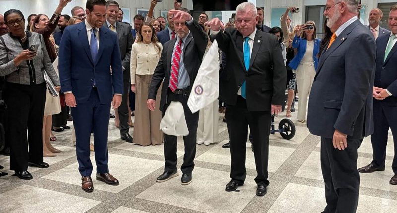 House Speaker Daniel Perez (left) and Senate President Ben Albritton (right) took part in a traditional hanky-drop ceremony marking the end of the legislative session. (Tom Urban/NSF)