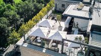 A person has died after falling from rooftop venue 2KW Bar and Restaurant in Adelaide