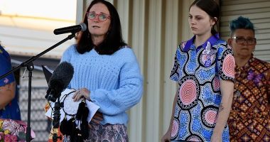 Phoebe's mother Kylie Johnson and her sister Kaylea at a candlelit vigil for Phoebe