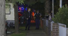 Police remain at the scene in Croydon Park where a man was found dead with stab wounds