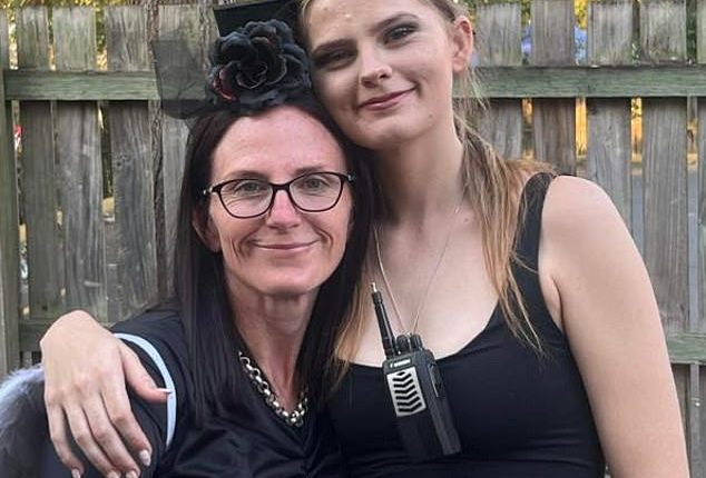 James Wood was told police were placing him 'under arrest for the homicide of Pheobe Bishop' before he was put in the backseat of a black unmarked police car