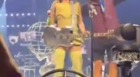 A man who shocked Katy Perry when he stormed on stage and accosted her during her Sydney concert on Sunday night has been charged