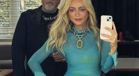 Kyle Sandilands (left) and Jackie O (right) are raking it in at ARN - but rank-and-file staffers tell us they fear for their jobs every day as management send roles overseas and go 'all in' on AI