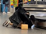 Shocking moment two women brawl in arrivals hall at Gatwick before it's broken up by airport staff