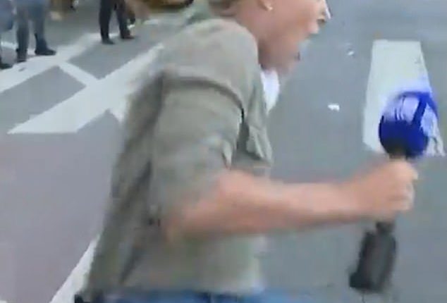 Australian reporter Lauren Tomasi (pictured) was shot by a rubber bullet whiel reporting on the LA riots