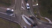 Two cars nearly collided after they drove over the diamond-shaped roundabout