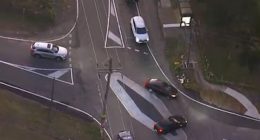Two cars nearly collided after they drove over the diamond-shaped roundabout