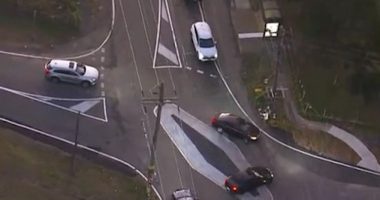 Two cars nearly collided after they drove over the diamond-shaped roundabout