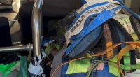 Inside the bus where one of Pheobe Bishop's accused murders, Tanika Bromley, lived was filled with rubbish and clothing (right)