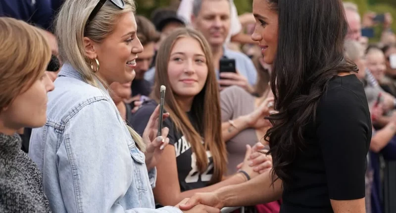 This Is What Woman in the Crowd Said to Meghan Markle Before Their Hug Went Viral