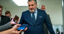 Sen. Ted Cruz, R-TX, walks to the Senate Chamber