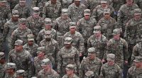 US Army Mountain division combat soldiers march during the Army 250th Anniversary Parade in Washington, DC on June 14, 2025