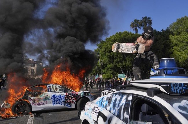 WATCH: The Shirtless Psycho in Minivan at the L.A. Riots
