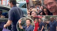 Watch Hugh Jackman jump into stranger’s car to escape chaotic mob of fans