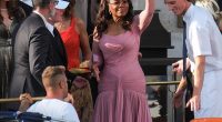 Oprah was worried about falling as she boarded the taxi boat that would take her to the luxurious $20 million wedding on Friday, also demanding that the porter let her 'wave' before she stepped on board