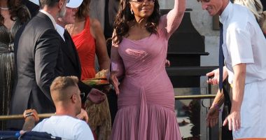Oprah was worried about falling as she boarded the taxi boat that would take her to the luxurious $20 million wedding on Friday, also demanding that the porter let her 'wave' before she stepped on board