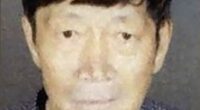 Guojun Xuan, 65, (pictured) and his partner Silvia Zhang, 38, were arrested for felony child endangerment this week after cops found they had 21 children from surrogate mothers