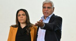 Warren Mundine (pictured with Liberal Senator Jacinta Nampijinpa Price) has called on the Prime Minister to stop dividing Australians