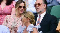 Gladiator star Russell Crowe (right) sat down in the Royal Box alongside his fiancee Britney Theriot (left)