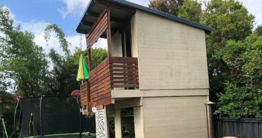 An Aussie builder has been threatened with a $740,000 fine for the cubby house he built for his daughter after neighbours complained the structure was an 'eyesore'.