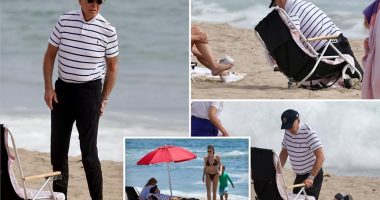 Biden struggles to set up beach chair in Malibu during first Fourth of July weekend since leaving office