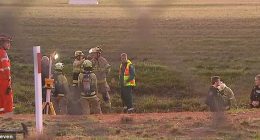Parafield Airport was shut down after a man in dark clothes was spotted on the runway