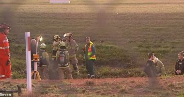 Parafield Airport was shut down after a man in dark clothes was spotted on the runway