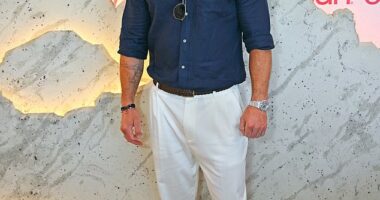 Chris Hemsworth attended Evian's VIP suite on the final day of Wimbledon without his wife Elsa Pataky on Sunday