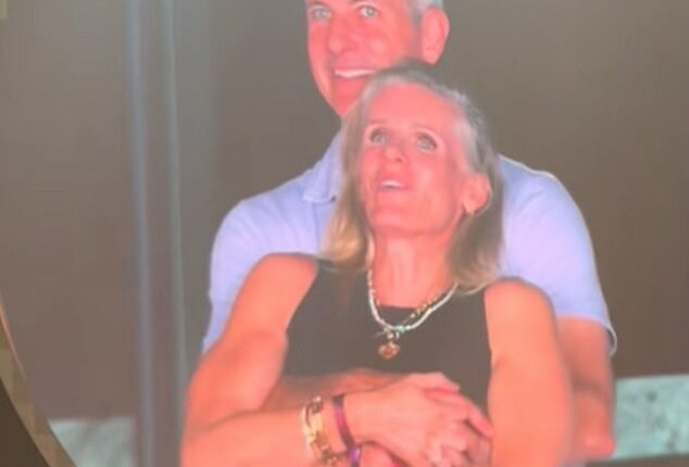 Chris Martin caught one camera-shy couple by surprise as he addressed the audience at a Coldplay concert - and joked that they were 'either having an affair' or were just very bashful