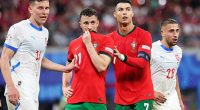 Cristiano Ronaldo and Diogo Jota stand together during their UEFA Euro 2024 match agaisnt the Czech Republic in June last year. The Portugal captain did not attend his teammate's funeral in Gondomar on Saturday