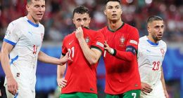 Cristiano Ronaldo and Diogo Jota stand together during their UEFA Euro 2024 match agaisnt the Czech Republic in June last year. The Portugal captain did not attend his teammate's funeral in Gondomar on Saturday