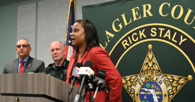 Superintendent LaShakia Moore with Sheriff Rick Staly and School Board Chair Will Furry during a press conference last May. (© FlaglerLive)