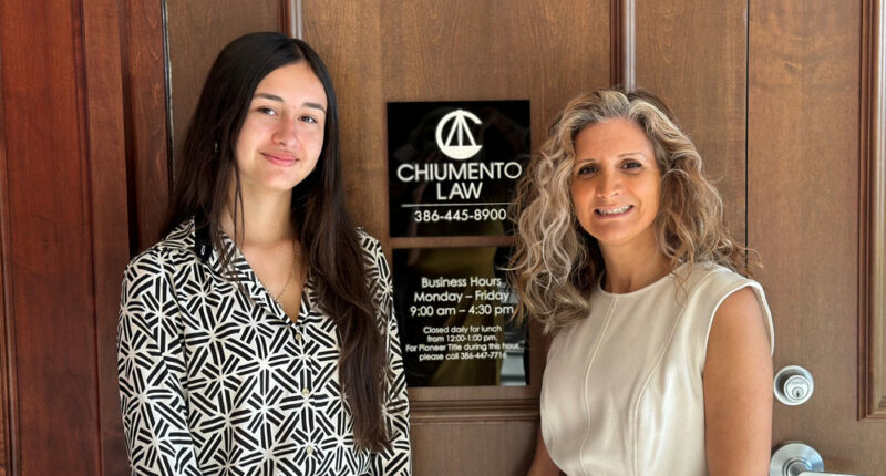 Alaria Krivoshey, left, with her Take Stock in Children mentor, Diane Vidal. (Chiumento Law)