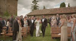 Heart-warming footage captures the moment a bride's father invites her stepfather to walk down the aisle with them