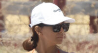 Eva Longoria, 50, puts her fit figure on display in a cheeky orange bikini on beach in Spain