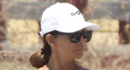 Eva Longoria, 50, puts her fit figure on display in a cheeky orange bikini on beach in Spain