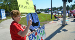 They almost get their wish, 13 years later: a tea party demonstration on Palm Coast Parkway on March 26, 2012. (© FlaglerLive)
