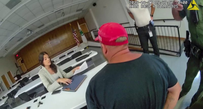 Gregory Alllen Smith being read his charges at his place of work on Friday. (FCSO)