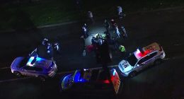 A teen allegedly attacked two female police officers who had been called to perform a welfare check on him in Sydney's west on Friday night. Pictured are police at the scene