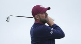 A grumpy Marc Leishman was not happy at being dragged out of bed for a 4am start, before producing some of his best golf to progress at The Open Championship