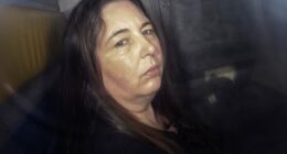 Erin Patterson arriving in the back of a prison vehicle at Latrobe Valley Magistrate's Court in Morwell, Australia, last month