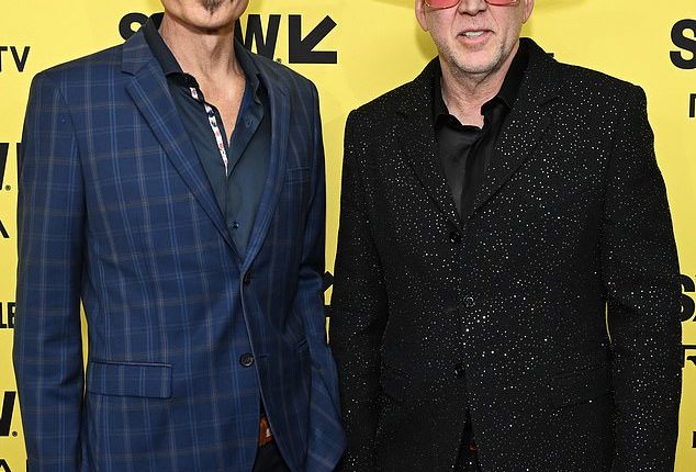 Julian McMahon (left) has been fondly remembered by Nicolas Cage, his co-star in the new film The Surfer, which they are pictured promoting at SXSW this March